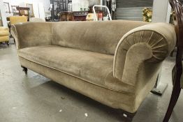 A VICTORIAN ROUND BACKED CHESTERFIELD SETTEE IN GREY VELVET