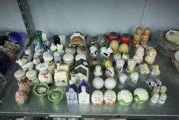 A COLLECTION OF APPROX 36 PAIRS OF CERAMIC NOVELTY PEPPER AND SALT POTS, INCLUDING CATS