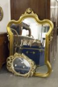 LARGE GILT FRAMED OVERMANTEL MIRROR, AND A PAIR OF SMALL OVAL GILT FRAMED MIRRORS