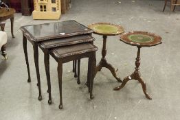 A MODERN NEST OF TABLES, GLASS INSET TOPS, SHAPED TOPS ON ELEGANT SUPPORTS AND TWO WINE TABLES