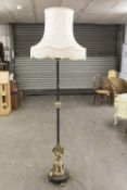 TWENTIETH CENTURY STANDARD LAMP WITH GILT CHERUB TO THE SUPPORT, MARBLE SPREAD BASE