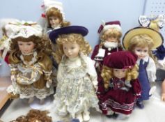 EIGHT, MAINLY LEONARDO COLLECTION, BISQUE FEMALE COSTUME DOLLS, all on metal display stands, up to