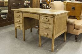 A LIGHT OAK DOUBLE PEDESTAL DESK