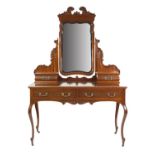 LATE NINETEENTH/EARLY TWENTIETH CENTURY CARVED MAHOGANY DRESSING TABLE, the rounded oblong top