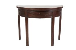 LATE EIGHTEENTH CENTURY MAHOGANY DEMI LUNE TEA TABLE, the fold over top above a deep frieze with