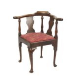 EIGHTEENTH CENTURY OAK CORNER CHAIR, of typical form with vase shaped splats, turned supports, and