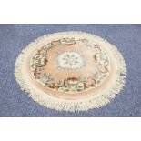 HAND-KNOTTED WASHED CHINESE OVAL RUG of Aubusson design with oval centre floral medallion on a plain