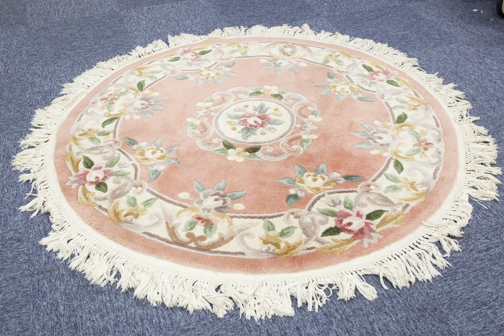 WASHED CHINESE ALL-WOOL CIRCULAR RUG of Aubusson design with off-white and floral embossed medallion