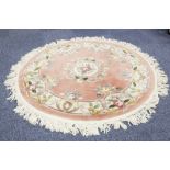 WASHED CHINESE ALL-WOOL CIRCULAR RUG of Aubusson design with off-white and floral embossed medallion