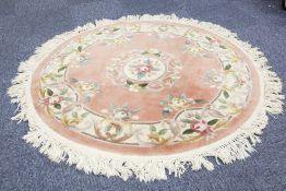 WASHED CHINESE ALL-WOOL CIRCULAR RUG of Aubusson design with off-white and floral embossed medallion