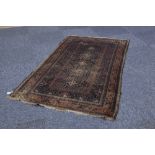 SHIRAZ SEMI ANTIQUE PERSIAN RUG, with five section pole medallion in brown and white on a black