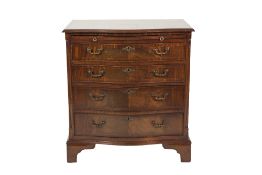 MODERN GEORGIAN STYLE FLAME CUT MAHOGANY SERPENTINE FRONTED BACHELOR'S CHEST, the crossbanded top