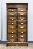 CIRCA 1920's MAHOGANY FILING CABINET OF 16 SMALL DRAWERS, in two tiers, the moulded top with