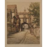 HENRY G. WALKER (1876-1932) COLOURED ETCHING Bygone street scene with gatehouse Signed 9 3/4" x 7