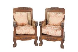 EARLY TWENTIETH CENTURY THREE PIECE CHINESE CARVED HARDWOOD AND DOUBLE CANED BERGERE SUITE, of