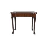 A LATE GEORGE II/EARLY GEORGE III PROBABLY IRISH MAHOGANY FOLD-OVER CARD TABLE, the top opening to