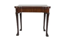 A LATE GEORGE II/EARLY GEORGE III PROBABLY IRISH MAHOGANY FOLD-OVER CARD TABLE, the top opening to