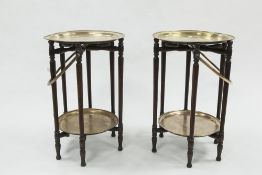 PAIR OF MIDDLE EASTERN BRASS TOPPED COFFEE TABLES, with folding bases, each with floral and Kufic