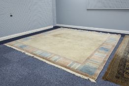 A NEPALESE PLAIN HAND WOVEN ALL-WOOL CARPET, with plain fawn field, the broad border with muted