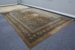 BORDERED WILTON CARPET OF PERSIAN DESIGN, with large circular centre medallion within an oval