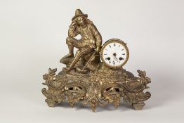 LATE NINETEENTH CENTURY FRENCH GILT METAL FIGURAL MANTEL CLOCK, the 3" enamelled Roman dial (