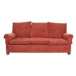 VICTORIAN THREE SEATER SETTEE, with cushions to the straight back and seat, scroll arms and turned