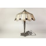 TIFFANY STYLE EMBOSSED WHITE METAL TABLE LAMP with white and brown 'leaded' shade, 23" (58.4cm) high