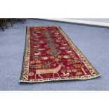 IRANIAN HAND MADE RUNNER with five leaf shaped pole medallions, midnight blue and floral on a