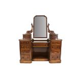 EARLY VICTORIAN TWIN PEDESTAL MAHOGANY DRESSING TABLE, each pedestal with four drawers and tuned