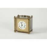 EARLY 20th CENTURY FRENCH GILT BRASS CASED CARRIAGE CLOCK OF LOW OBLONG FORM RETAILED BY 'HARRODS