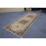 EASTERN RUNNER with triple circular medallion pattern and all over trailing floral and foliate