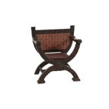 NINETEENTH CENTURY RENAISSANCE REVIVAL CARVED OAK 'X' FRAME OPEN ARMCHAIR, of typical form,