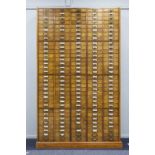 PRE-WAR LIGHT OAK FILING UNIT OF 160 SMALL FOOLS CAP SIZE DRAWERS, arranged in five columns, each of