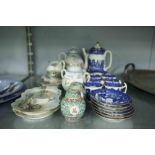 A SPODE BLUE AND WHITE COFFEE SERVICE FOR FIVE PERSONS AND A JAPANESE EGG SHELL PART COFFEE