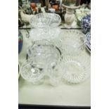 THREE LARGE CUT GLASS FRUIT BOWLS, A CUT GLASS CAKE PLATE, A PEDESTAL CAKE PLATE, A PEDESTAL CAKE