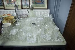 QUANTITY OF CUT AND OTHER GLASS WARES INCLUDING; BOWLS, VASES, CANDLESTICKS, ASHTRAYS ETC.......