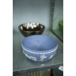 A POTTERY SILVER LUSTRE FRUIT BOWL AND A TWENTIETH CENTURY WEDGWOOD PALE BLUE AND WHITE FRUIT