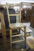 A CHILD'S OAK HIGH CHAIR