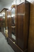 AN EARLY TWENTIETH CENTURY OAK BEDROOM SUITE, COMPRISING; CHEST OF DRAWERS, WARDROBE WITH SINGLE