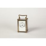 LATE NINETEENTH/EARLY TWENTIETH CENTURY BRASS CASED CARRIAGE CLOCK, of typical form with top