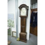 A REPRODUCTION MAHOGANY CASED LONGCASE CLOCK, the arched brass dial dated 1981