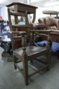 NINETEENTH CENTURY ELM OPEN ARMCHAIR, WITH LADDER RAIL BACK AND PANEL SEAT