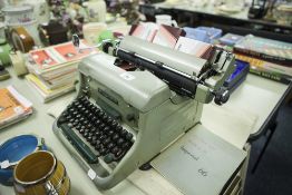 AN IMPERIAL 66 TYPEWRITER, GREEN AND SILVER