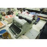 AN IMPERIAL 66 TYPEWRITER, GREEN AND SILVER