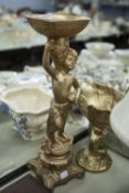 A GILT 'HEIRLOOM POT POURRI STAND, CHERUB SUPPORTING A BOWL AND A SIMILAR STAND (2)