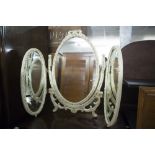 A LARGE OBLONG BEVELLED WALL MIRROR IN GILT FRAME AND AN OVAL TRIPLE TOILET MIRROR