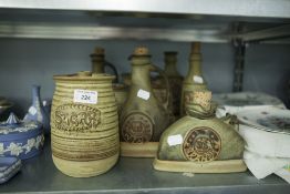 NINE STONEWARE DRINK ORNAMENTS AND TEA WARES VARIOUS