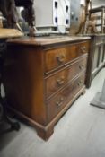 SMALL LOW GEORGIAN STYLE MAHOGANY CHEST OF THREE GRADUATED DRAWERS WITH SWAN NECK LOOP HANDLES ON