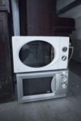 A SWAN MICROWAVE OVEN AND A PACIFIC GREY MICROWAVE OVEN (2)