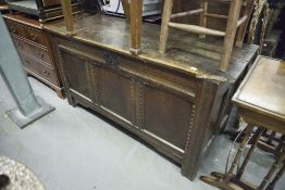 ANTIQUE CARVED OAK DOWER CHEST WITH PLANK TOP AND THREE PANEL FRONT, ORIGINAL WROUGHT METAL LOCK (